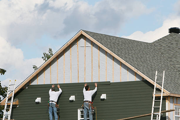 Professional Siding Installation technician working in Marlborough, MA